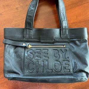 Reposh @j_lang924 See by Chloe Small Black leather bag.